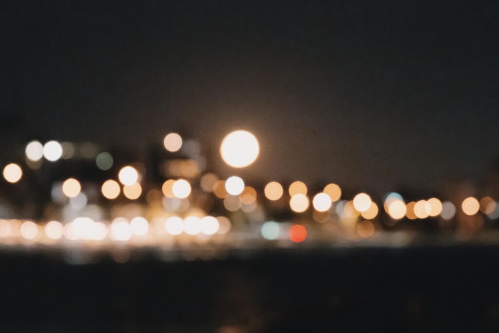 Out-of-focus city lights create a