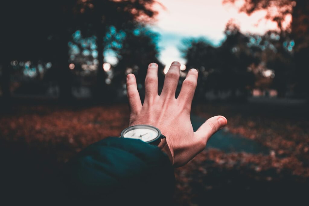 A person's hand extends towards a